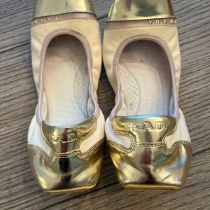 Prada authentic gold and cream leather ballet slippers.